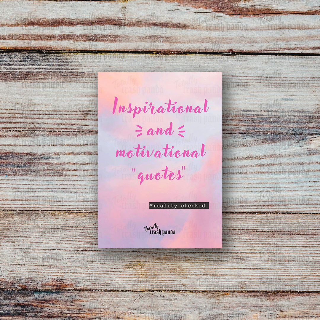 A book cover with a pink and light blue watercolor background, featuring the text 'Inspirational and motivational quotes' in pink script, and the brand name 'Finally created by' at the bottom, displayed on a rustic wooden plank background.