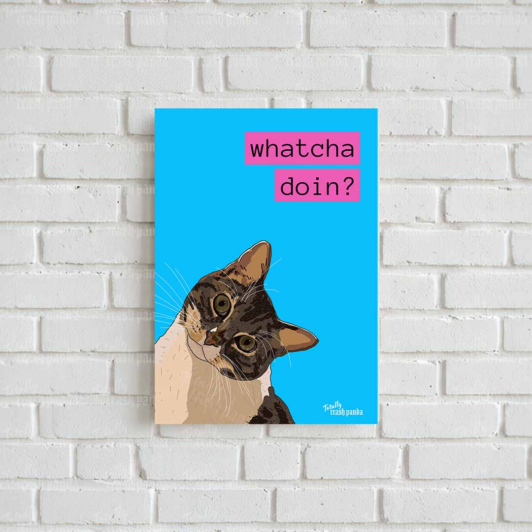 Totally Trash Panda's Whatcha Doin? Cat illustration poster shown against a brick wall